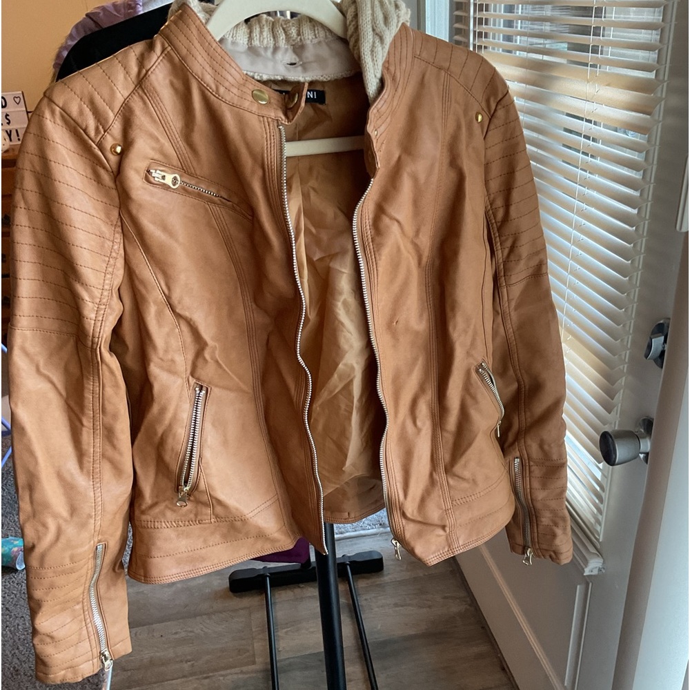 Brown, hooded, leather jacket. Never worn. Size small.